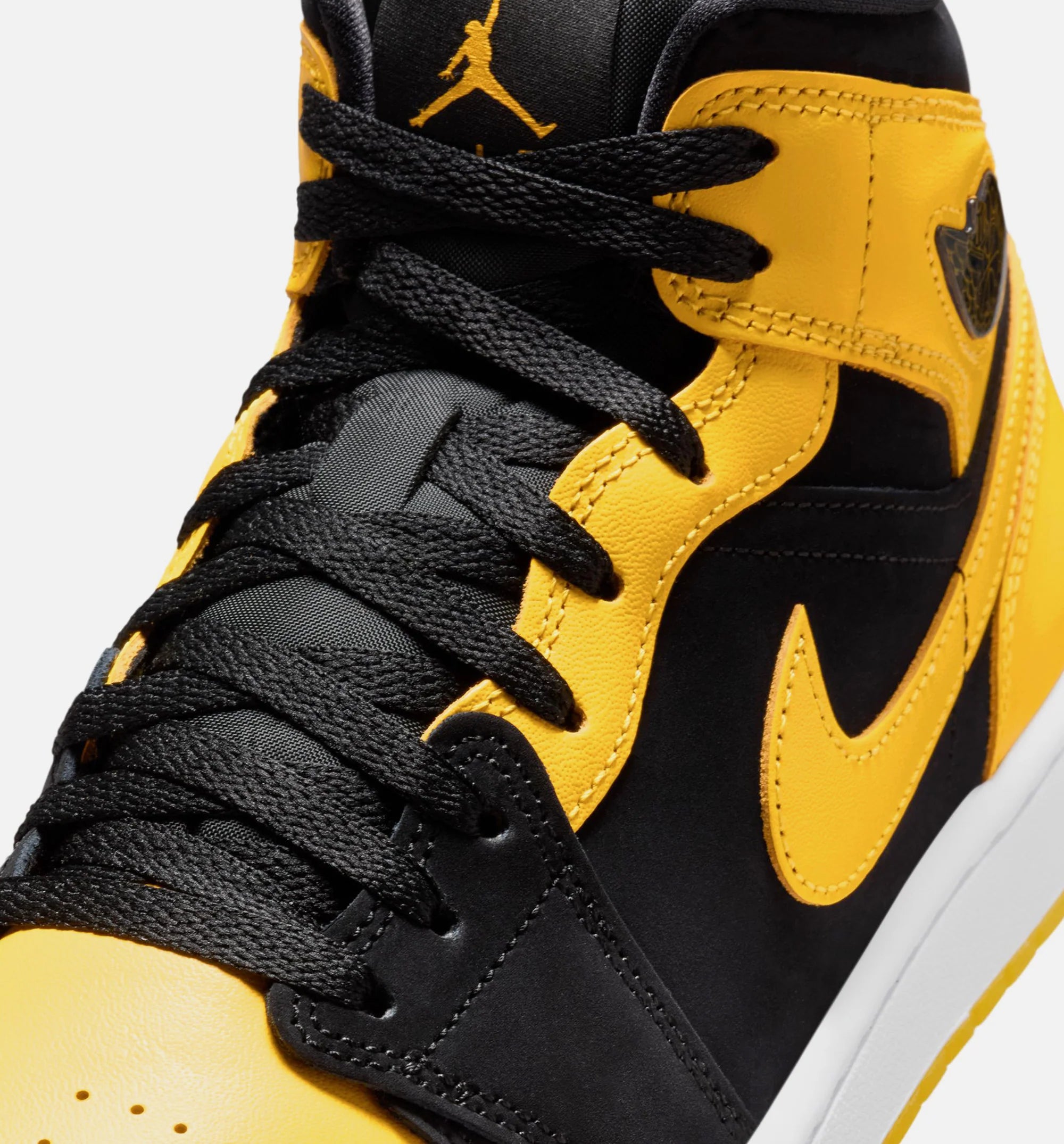 Air Jordan 1 Mid SE Mens Lifestyle Shoe Black White Varsity Maize